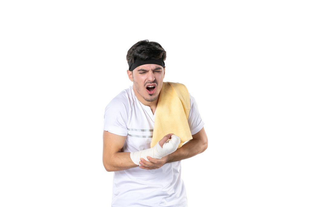 front view young male with bandage his hurt hand white background fit gym athlete pain sport body diet injury